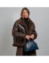 Borsa a mano in pelle con tracolla e silhouette arrotondata The Bridge Magda – Notte/Oro
